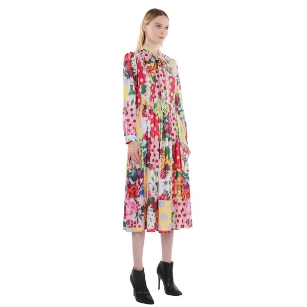 3/4 view of Floral & polka dot blocked chiffon long dress