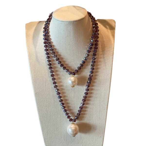 Double jumbo pearl necklace with plum colored crystal